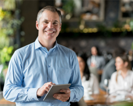 waiter holding tablet using easy Restaurant taking orders